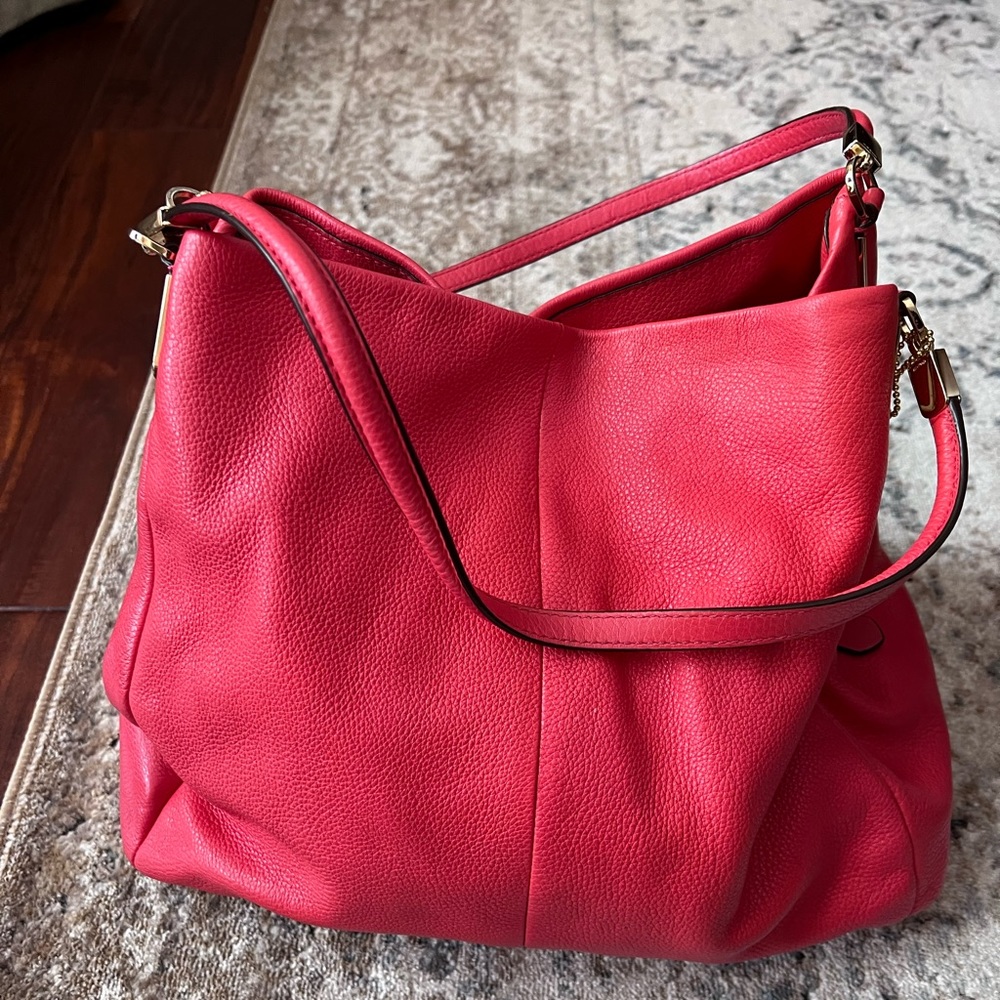 Beautiful melon color Coach shoulder bag
